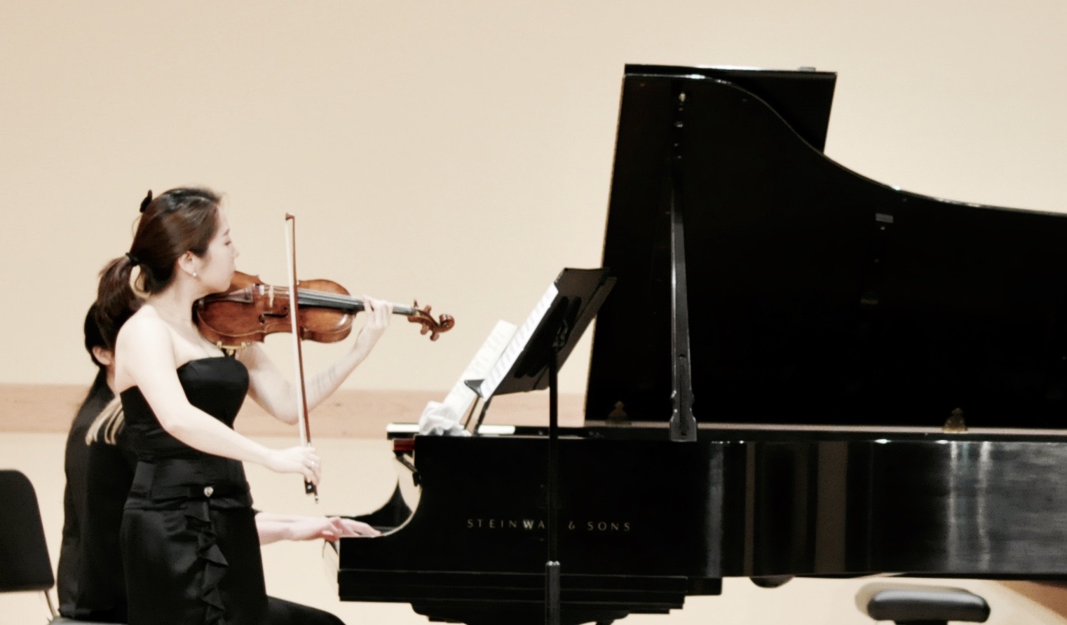 Violin strings and warm studio lighting